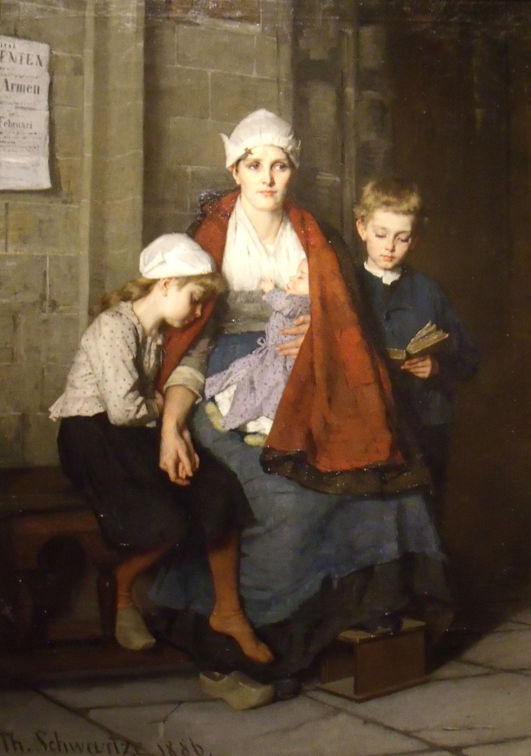 A woman with her three children at church