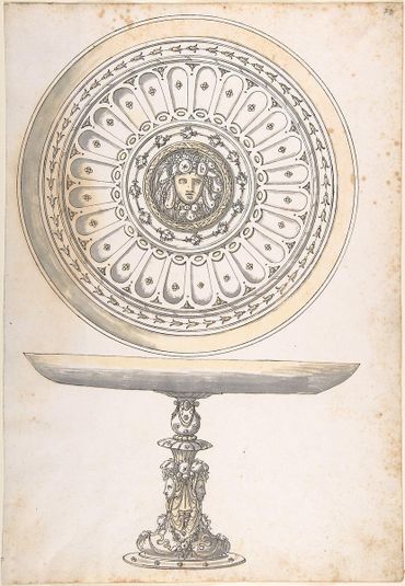 Shallow Round Dish on tall Pedestal Decorated with Fruit and Female Masks