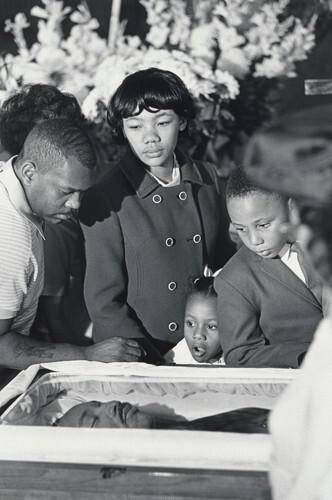 Dr. King's children view his body lying in state, Sister's Chapel, Spellman College, Atlanta