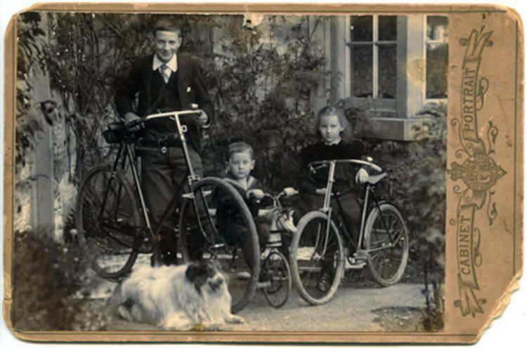 Photograph Depicting Children With Bicycles