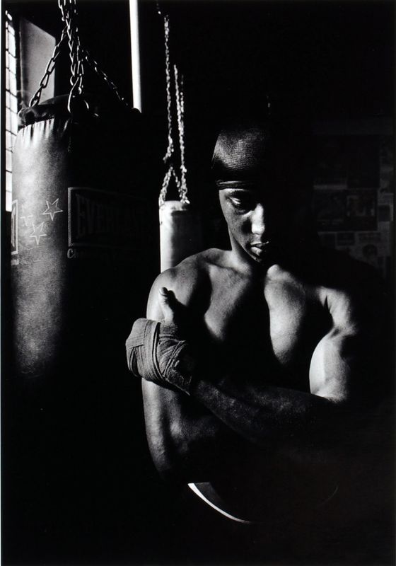 Unidentified boxer with arms crossed