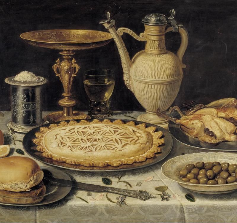 Table with Orange, Olives and Pie
