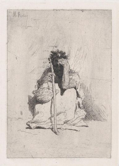 A beggar, seated on the ground holding a stick