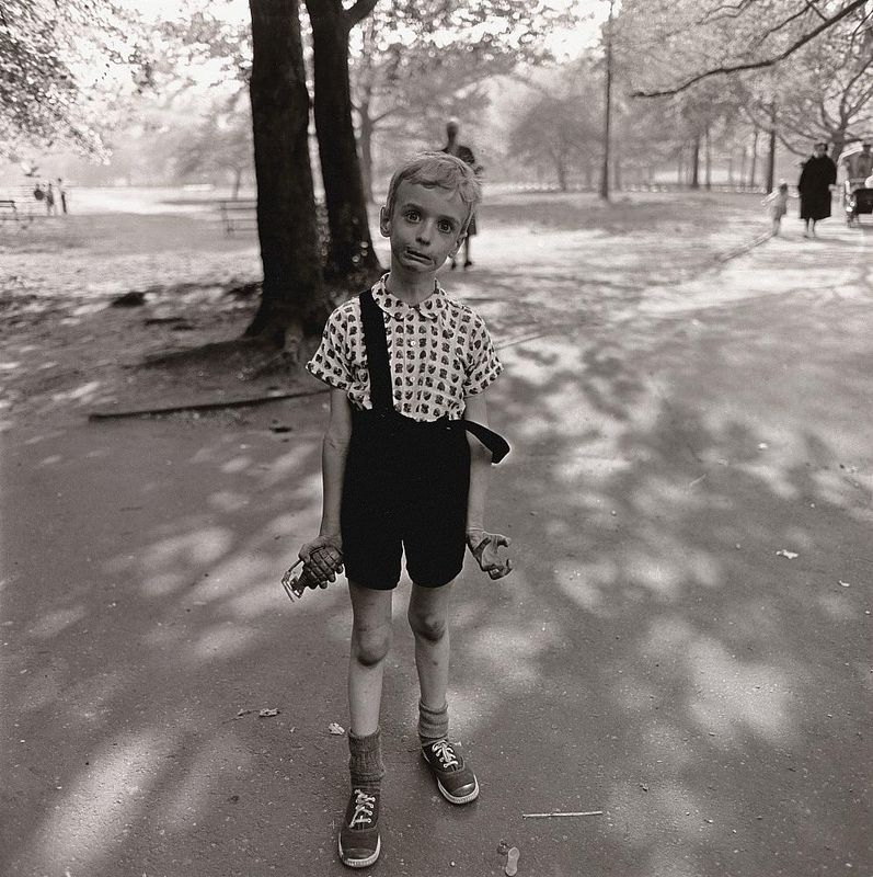 Child with a toy hand grenade in Central Park, NYC