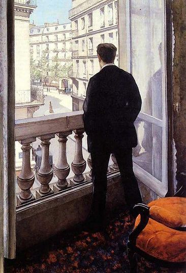 Hombre joven en la ventana