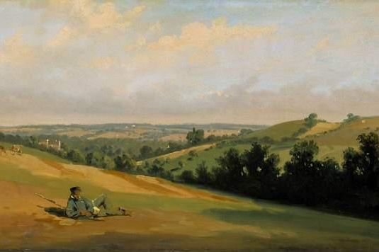 Young man reclining on the downs