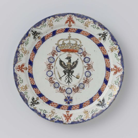 Three plates with the coats of arms of European noblemen