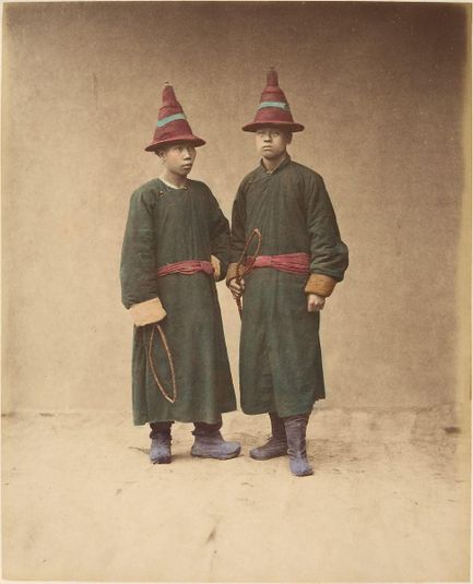 [Two Chinese Men in Matching Traditional Dress]