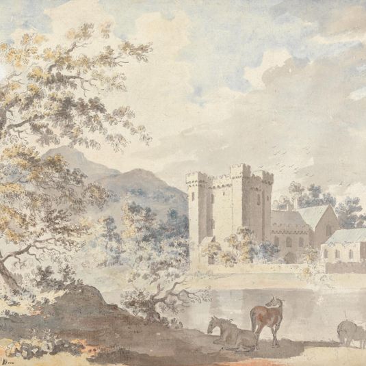 Castle below mountains with horses by a river