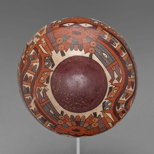 One of a Pair of Matched Bowls Depicting Costumed Ritual Performers