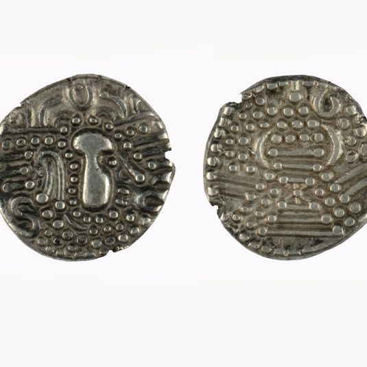 ठप्पांकित सिक्का- ७७१२