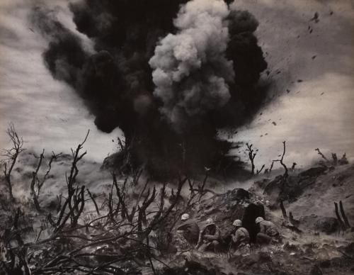 U.S. Marines blasting out a cave on Hill 382 during the Battle of Iwo Jima