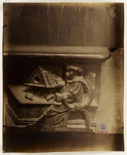 Bas-relief de la miséricorde, un savant lisant au lutrin, église Saint-Gervais-Saint-Protais, 4ème arrondissement, Paris