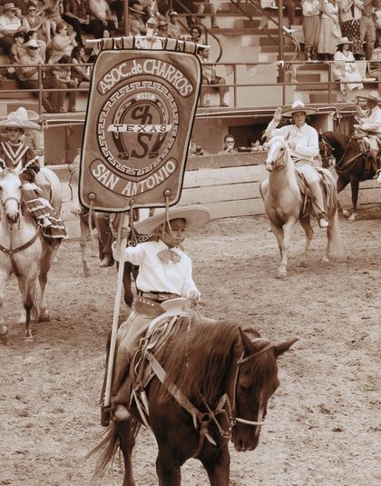 Young Charro with Banner