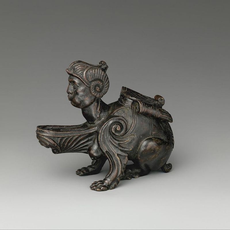 Oil lamp in the form of a sphinx