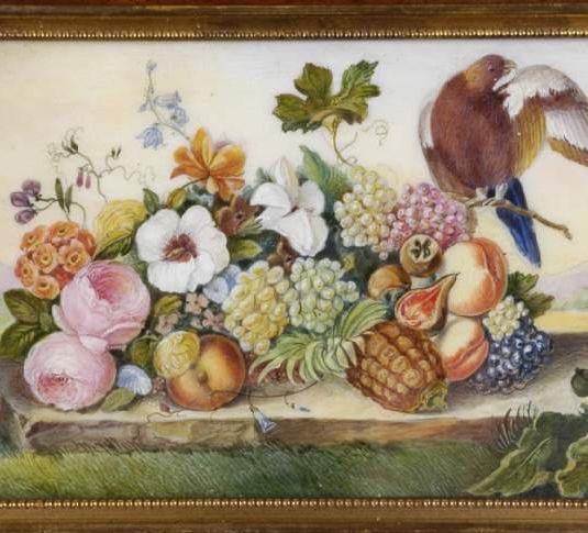Fruit and flowers with a bird on a stone slab in a meadow with landscape background