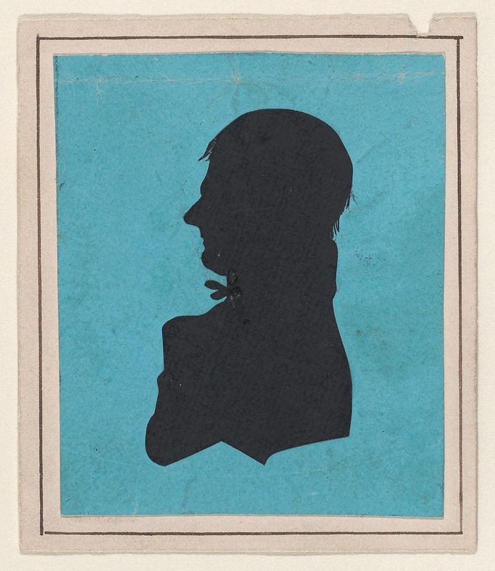Silhouette of a man facing left