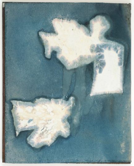Untitled (manila paper stained blue with black ink wash design)
