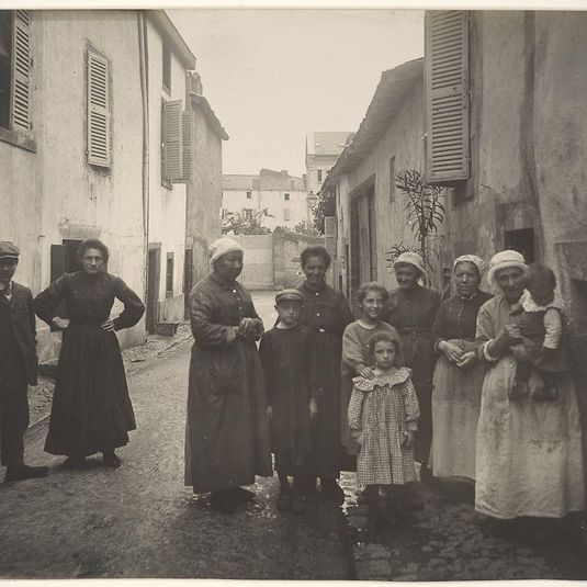 [Group of Adults and Children on a Village Street in the Auvergne]