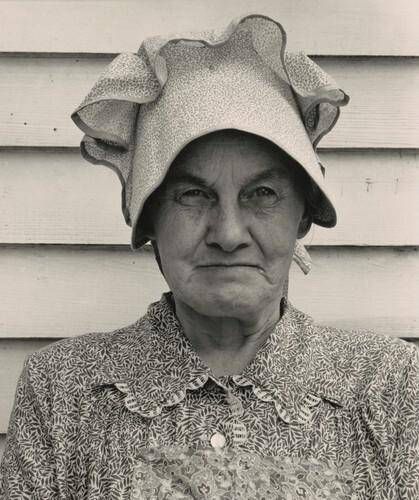 Member of the congregation of Wheeley's church who is called "Queen." She is wearing the old fashioned type of sunbonnet. Her dress and apron were made at home. Near Gordonton, North Carolina
