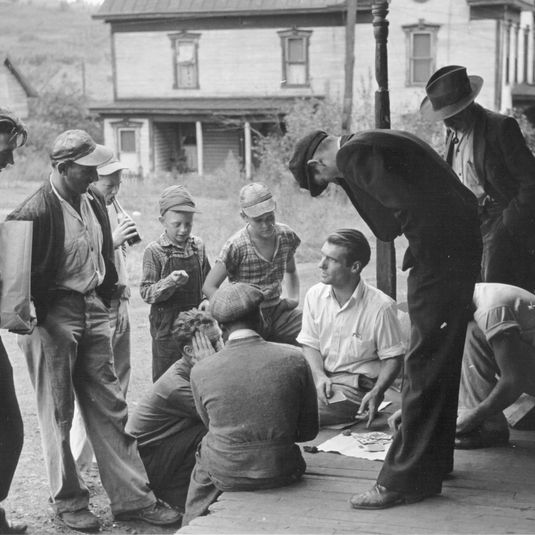 Coal miners' card game on the porch, Chaplin, West Virginia