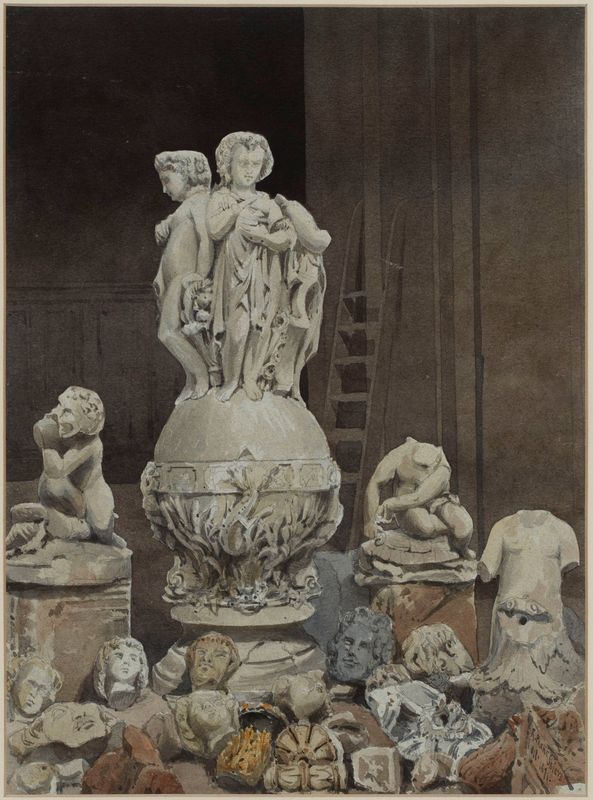 Vestiges d'éléments sculptés décorant l'Hôtel de Ville en 1871.