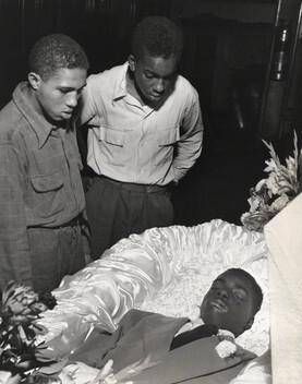 In mortuary Red and Herbie Levy study wounds on face of Maurice Gaines, a buddy of theirs who was found dying one night on a Harlem sidewalk