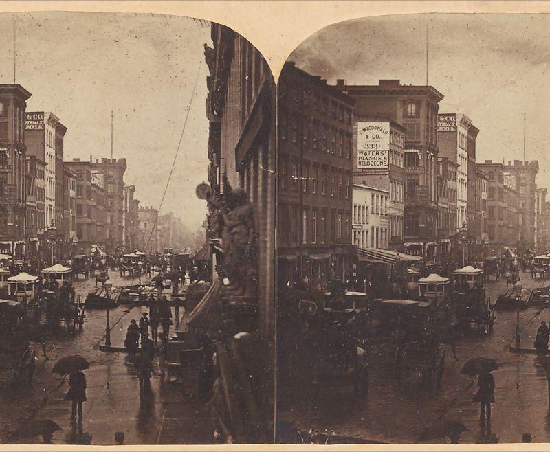 [Broadway in the Rain, likely taken from 308 or 310 Broadway, New York City]