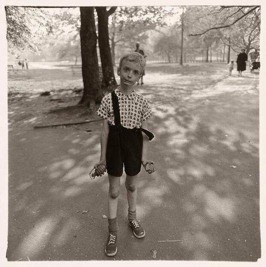 Child with toy hand grenade, N.Y.C. 1962