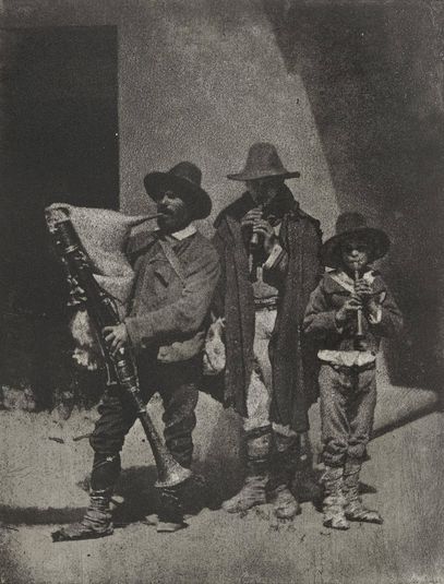 Group of Three Bag Pipers Standing on the Corner of 21 Quai Bourbon