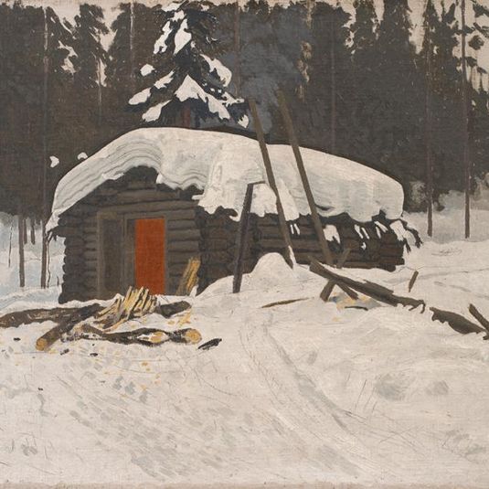 Norsk tømmerhytte med sne