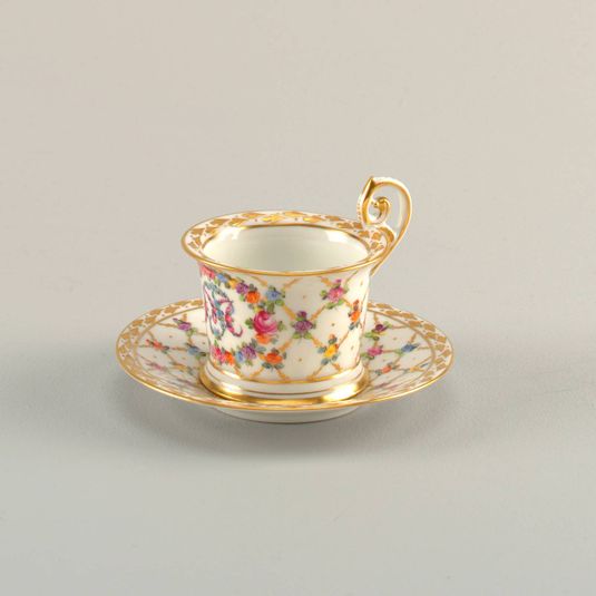 Cup and Saucer with Monogram and Diamond Lattice Pattern
