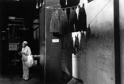 A Woman With Hanging Overalls, from the "Harlem, USA" portfolio