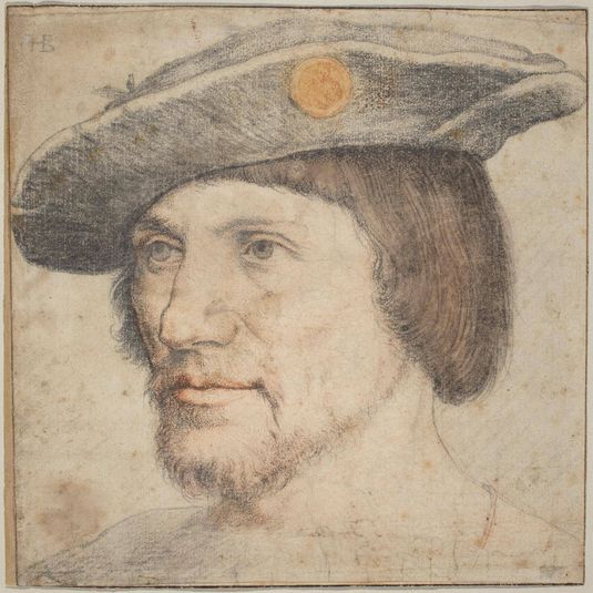 Portrait of a Man Wearing a Hat with a Medallion