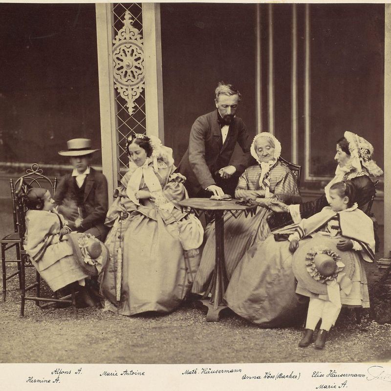 [Group Portrait of Five Adults and Two Children in a Garden]