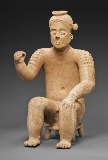 Seated Male Figure with One Arm Raised
