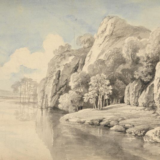 River Bank With High Rocks