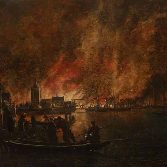 Nächtliches Feuer über holländischer Stadt