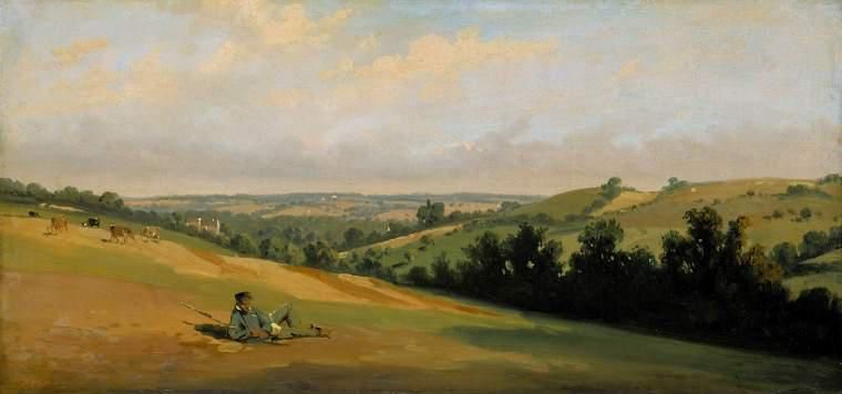 Young man reclining on the downs