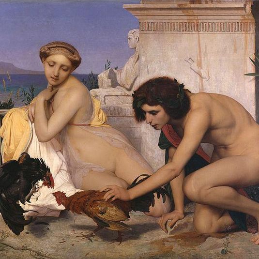 Jóvenes griegos presenciando una pelea de gallos