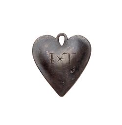Token: Engraved heart-shaped pendant