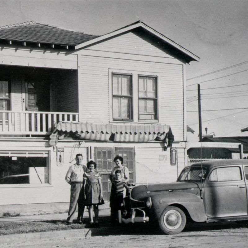 Carmignani family in front of store, 1502 13th Street, Galveston, Texas