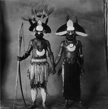 Two New Guinea Men Holding Hands