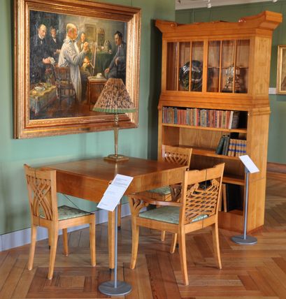 Bookcase and table with four chairs