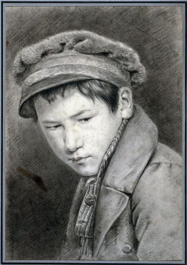 Portrait d'un jeune garçon à la casquette