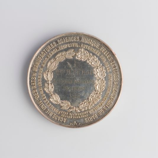 Médaille décernée à Mme Le Roi, secrétaire particulier du cabinet par l'académie universelle des arts et manufactures, 1858