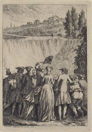 Group of People Looking at a Waterfall