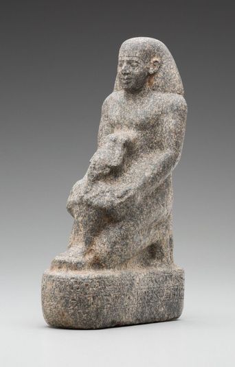 Kneeling Man Holding a Statue of the God Osiris