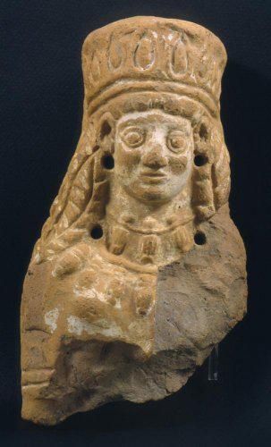 Part Of A Female Figurine With Peplos