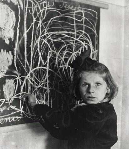 Tereska, a child in a Polish residence for disturbed children, grew up in a concentration camp. She drew a picture of "home" on the blackboard.
